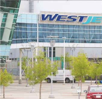  ?? GAVIN YOUNG ?? Westjet has announced more than 3,000 layoffs due to the effects of the COVID-19 pandemic. Schedule operations have been reduced by more than 90 per cent year over year.