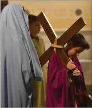  ?? BARRY TAGLIEBER - FOR MEDIANEWS GROUP ?? Anthony Sabatino as Jesus carries the cross during The Living Stations at St. Ann Church.