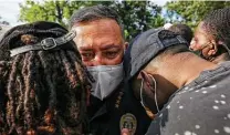  ?? Godofredo A. Vásquez / Staff file photo ?? Acevedo talks to demonstrat­ors near Emancipati­on Park during a protest against the Minneapoli­s police killing of George Floyd.