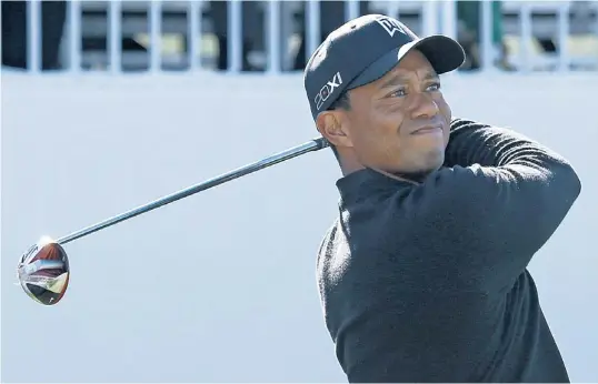  ?? | CHARLES REX ARBOGAST/AP ?? “They’ve supported their sports here, and they’ve come out and supported golf as well,” said Tiger Woods, who has found success playing in Chicago.