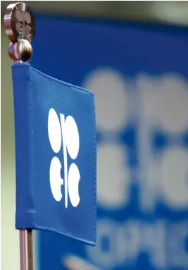  ?? —REUTERS ?? The Opec flag and the Opec logo are seen before a news conference in Vienna, Austria.
