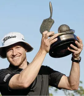  ?? /Reinhold Matay-USA Today ?? Victorious: Peter Malnati celebrates winning the Valspar Championsh­ip.