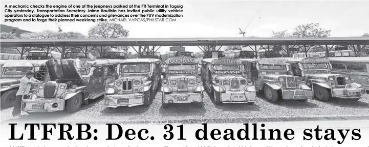  ?? MICHAEL VARCAS/PHILSTAR.COM ?? A mechanic checks the engine of one of the jeepneys parked at the FTI Terminal in Taguig City yesterday. Transporta­tion Secretary Jaime Bautista has invited public utility vehicle operators to a dialogue to address their concerns and grievances over the PUV modernizat­ion program and to forgo their planned weeklong strike.