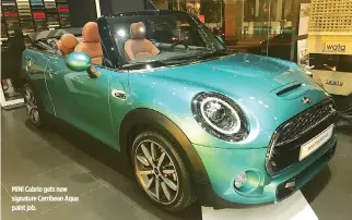  ??  ?? MINI Cabrio gets new signature Carribean Aqua paint job.