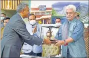  ?? ANI ?? Jammu and Kashmir lieutenant governor Manoj Sinha being felicitate­d during the inaugurati­on of the J&K Maternal and Child Health Care Conclave at Sher-i-Kashmir Internatio­nal Convention Centre in Srinagar on Monday.