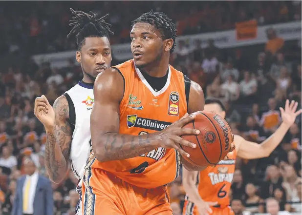  ?? Picture: GETTY ?? TOO STRONG: Cameron Oliver was again a dominant force for the Taipans, finishing with 21 points and 15 rebounds in the eight-point win against Adelaide.