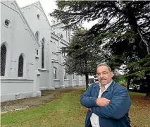  ?? PHOTO: TETSURO MITOMO/FAIRFAX NZ ?? Coptic Church member Hesham Mikhail outside his church this week.