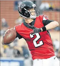  ?? AP PHOTO ?? Atlanta Falcons quarterbac­k Matt Ryan warms up before Sunday’s NFL wild-card playoff game against the Los Angeles Rams in Los Angeles.