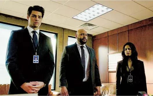  ?? NETFLIX ?? Noah Centineo (from left), Colton Dunn and Aarti Mann star in “The Recruit,” one of a handful of espionage dramas to hit streaming in recent weeks.