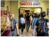  ?? RALPH BARRERA / AMERICANST­ATESMAN ?? Students at Kealing Middle School in East Austin change classes in May. School campuses won’t be graded on an A-F scale until 2019.