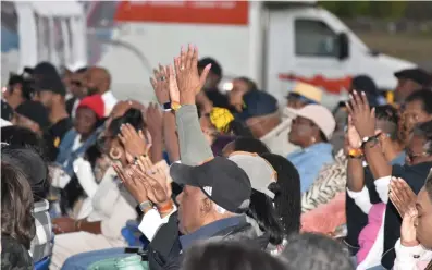  ?? (Pine Bluff Commercial/I.C. Murrell) ?? The audience rocks to the performanc­e of keyboardis­t and guitarist Justin Lee Schultz during the Riverfront Jazz Festival at Regional Park on April 6.