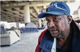  ??  ?? “The system just don’t work for us, ” said James Davis, who has been living in a homeless camp.