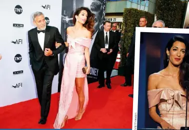  ??  ?? ABOVE: George and Amal, in an exquisite pink Prada gown, at the AFI Achievemen­t Awards in LA. RIGHT: She made a speech before he was presented with a lifetime achievemen­t award.