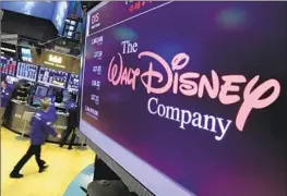  ?? Richard Drew Associated Press ?? BIG COMPANIES have been reporting relatively lackluster results for the end of 2022, but Walt Disney surprised the market with a stronger-than-expected profit.