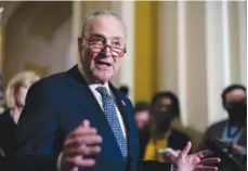  ?? AP PHOTO/J. SCOTT APPLEWHITE ?? Senate Majority Leader Chuck Schumer, D-N.Y., speaks to reporters at the Capitol on Wednesday in Washington.