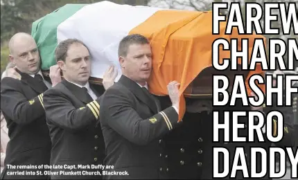  ??  ?? The remains of the late Capt. Mark Duffy are carried into St. Oliver Plunkett Church, Blackrock.