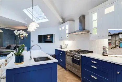  ??  ?? Above: The blue-hued new kitchen and cooker at Larkfield Gardens; the exterior of the restored 1930s former Guinness worker’s home with period-correct front door