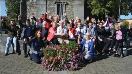  ?? Photo by Fergus Dennehy ?? Listowel Tidy Towns Committee celebrate after winning Ireland’s Tidiest Town for the second year in-a-row.