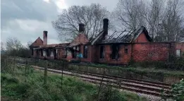  ?? ANDY NASH/LSHG ?? The burnt-out remains of Lydd station on the morning of November 8 after the fire was extinguish­ed.