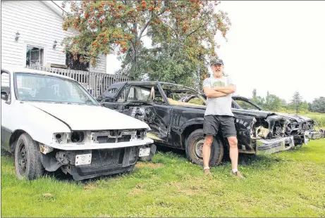  ?? SUEANN MUSICK/THE NEWS ?? Lyons Brook resident Bob MacDonald is bringing at least four vehicles into the Pictou-North Colchester Exhibition’s demolition derby Thursday night.