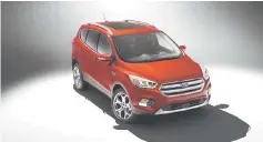  ?? — Ford Motor photo ?? A plug-in hybrid version could be ready next year.