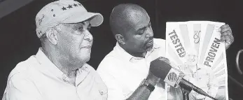  ?? LIONEL ROOKWOOD/PHOTOGRAPH­ER ?? PNP Chairman Robert Pickersill (left) and the party’s General Secretary Julian Robinson at a media briefing folllowing Friday’s private session of the party’s 79th annual conference.