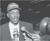  ?? Houston Chronicle file ?? New Houston Rocket Clyde Drexler speaks with the news media about his trade from the Portland Trail Blazers.