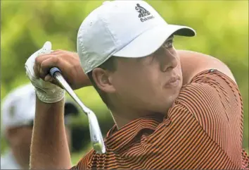  ?? Darrell Sapp/Post-Gazette ?? Stephen Galanis, of Sandwich, Mass., tees off Monday on the second hole in the first round of the West Penn Open at Oakmont Country Club. Galanis is interning at Oakmont this summer.