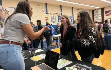  ?? Shamaya Sutton/appeal-democrat ?? Freshman students speak with a local business representa­tive on Thursday morning during Wheatland Union High School’s college and career event in Wheatland.