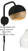  ??  ?? Mater ray black wall lamp in oak and steel, £175, Cloudberry Living