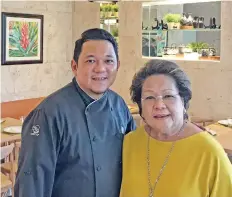 ??  ?? Bringing back the good old Cafe Laguna offerings to Davao. Lita Urbina with son, Chef Rocky