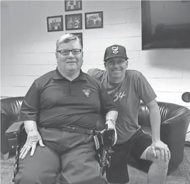  ??  ?? Ian McDonald (left), a communicat­ions adviser to Baseball New Zealand, presented Diamondbac­ks manager Torey Lovullo with a Baseball New Zealand cap. McDonald spent four weeks in Arizona learning about baseball operations with the Diamondbac­ks.