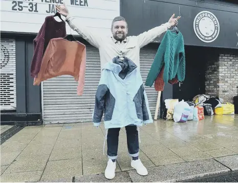  ??  ?? Organiser Iain Lane with a selection of items which can be picked up by those in need at Take One Leave One Sunderland.