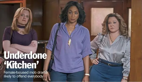  ?? Alison Cohen Rosa photos ?? Elisabeth Moss, left, as Claire, Tiffany Haddish as Ruby and Melissa McCarthy as Kathy in New Line Cinema’s mob drama “The Kitchen.”