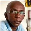  ??  ?? Human rights activist Rene Mugenzi, a father of three, was warned by Scotland Yard that a Kigali hit squad had been sent to track him down