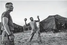  ?? Tamir Kalifa / New York Times ?? Soldiers exercise in Donna at a base set up along the border, even as Texas border agents are sent out of state, worrying Rep. Henry Cuellar over the effect on the Texas economy.