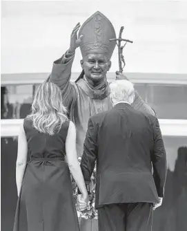  ?? DOUG MILLS/THE NEW YORK TIMES ?? President Donald Trump and first lady Melania Trump attend a wreath-laying ceremony June 2 at Saint John Paul II National Shrine in Washington, D.C.