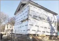  ?? File photo ?? The house at 387 Lenox St., New Haven was restored in a joint project between Habitat for Humanity of Greater New Haven and Raise the Roof, the Shoreline Habitat connection.