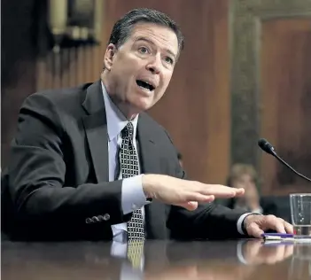  ?? CAROLYN KASTER/THE ASSOCIATED PRESS ?? FBI Director James Comey testifies on Capitol Hill in Washington D.C. , Wednesday, before the Senate Judiciary Committee hearing.