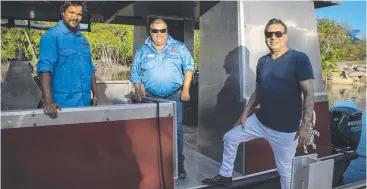  ?? ?? Vincent, Dale and Dewayne Mundraby with the new boat Mandingalb­ay Ancient Indigenous Tours will use to attract tourists.