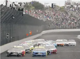  ?? BRIAN LAWDERMILK/GETTY IMAGES ?? NASCAR’s Brickyard 400 is set for July 5 at the Indianapol­is Motor Speedway, but this year’s race will take place without fans in the stands.