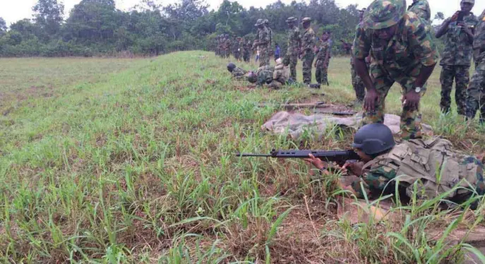  ??  ?? The FOC Naval Training Command, Rear Admiral Obi Ofodile, leading other personnel at the shooting range in Owode, Ogun State