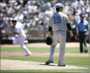  ?? TONY AVELAR — ASSOCIATED PRESS ?? Oakland Athletics’ Matt Joyce, left, rounds the bases after hitting a solo home run as New York Yankees pitcher Masahiro Tanaka (19) stands on the mound during the first inning of a baseball game on Saturday, June 17, 2017 in Oakland, Calif.