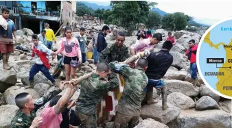  ?? Photograph: AP ?? People are pulled from the debris in Mocoa