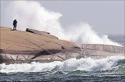  ?? METRO HALIFAX PHOTO ?? Waves pound the rocks at Peggy’s Cove in this file photo.