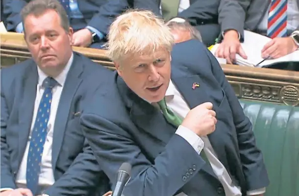  ?? ?? DOWN BUT NOT OUT: Prime Minister Boris Johnson appears in the Commons for the first time since facing a revolt by 148 of his fellow Tory MPs.