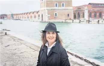  ??  ?? GALLIC TOUCH: Christine Macel, chief curator of the Pompidou Centre in Paris and curator of this year’s Venice Biennale, outside the Arsenale, one of the exhibition’s venues, in Venice.