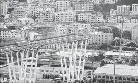  ?? FEDERICO BERNINI BLOOMBERG ?? The Oversteek Bridge in the Netherland­s, above, and the collapsed bridge in Genoa, Italy. Despite years of warnings about too little investment in European bridges, experts and government­s cannot say for sure how serious the risk of collapse is.