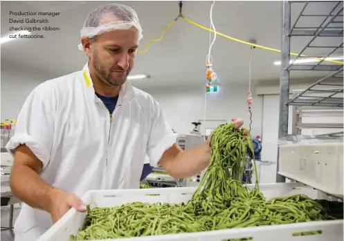  ??  ?? Production manager David Galbraith checking the ribboncut fettuccine.