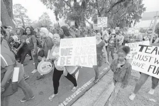  ?? TORI LYNN SCHNEIDER/AP ?? Thousands marched from the Donald L. Tucker Civic Center to the Florida Historic Capitol in Tallahasse­e.